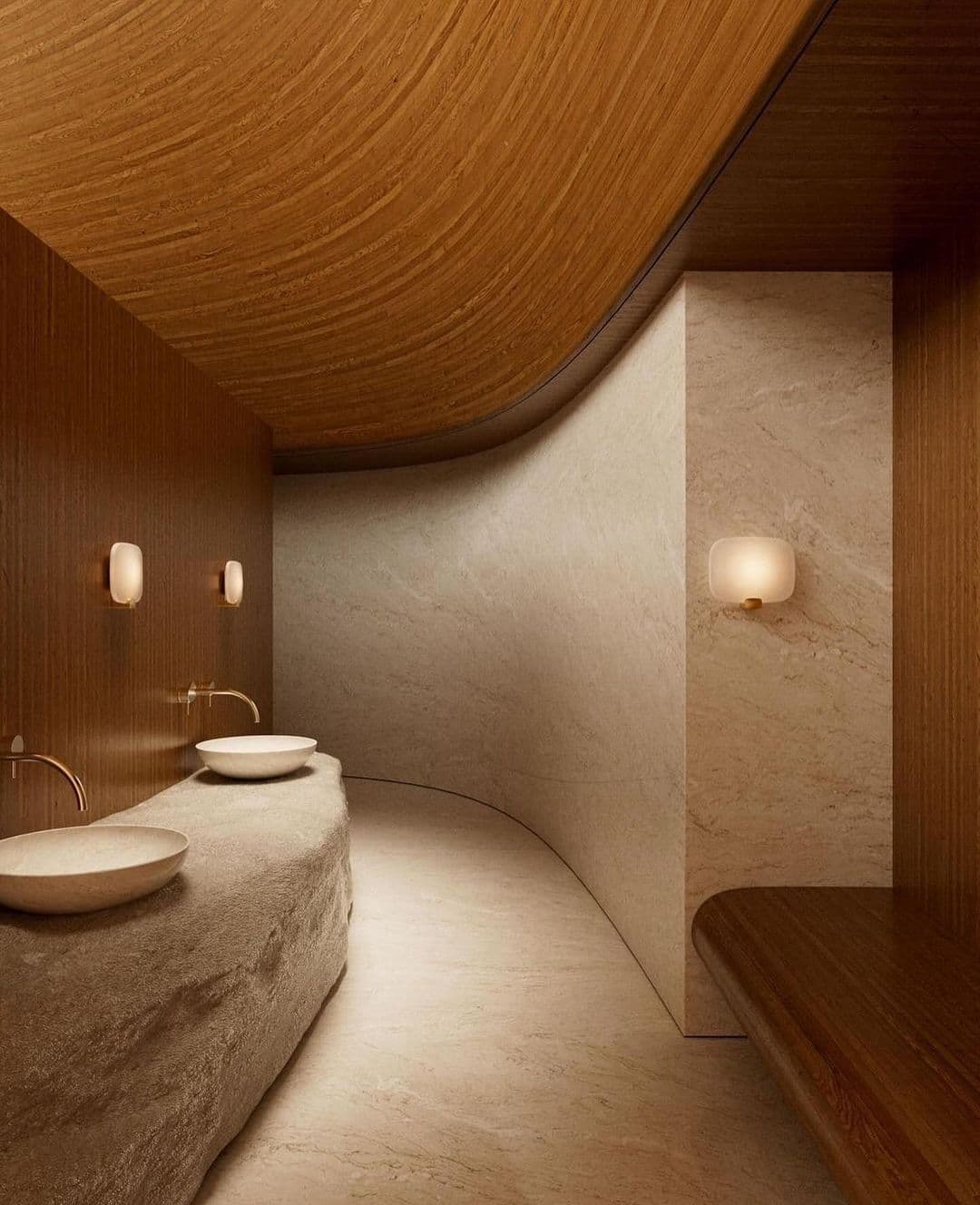 Warm wooden alcove with stone basin