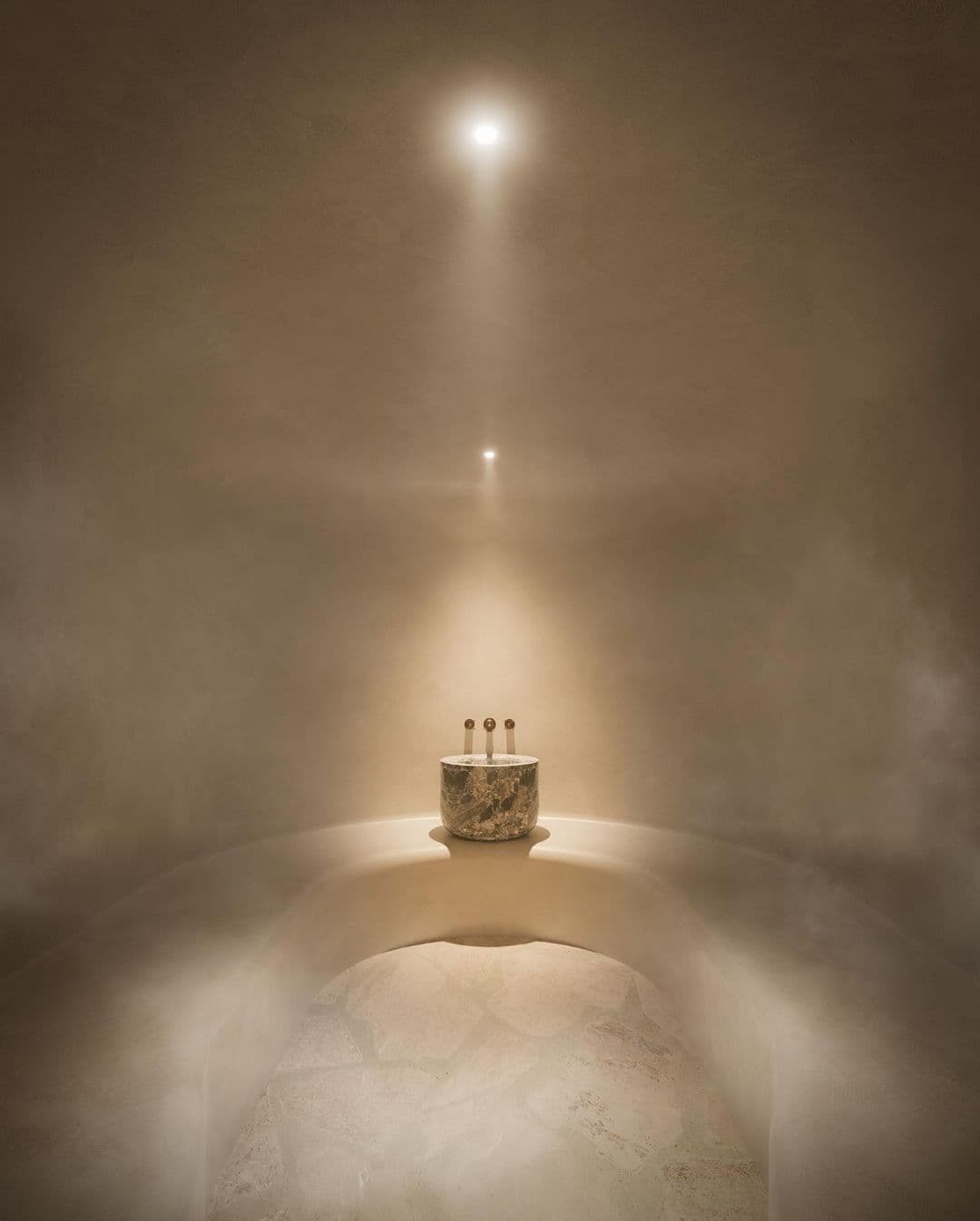 Hammam in the steam, lit from above