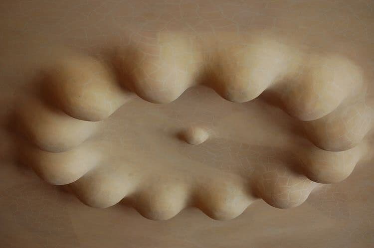 Cream sculpted relief, interplay of textures