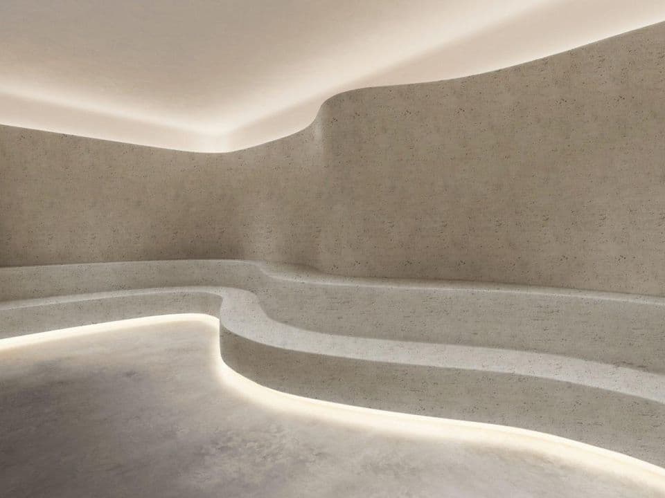 Mineral spa with sculpted curves, light stone
